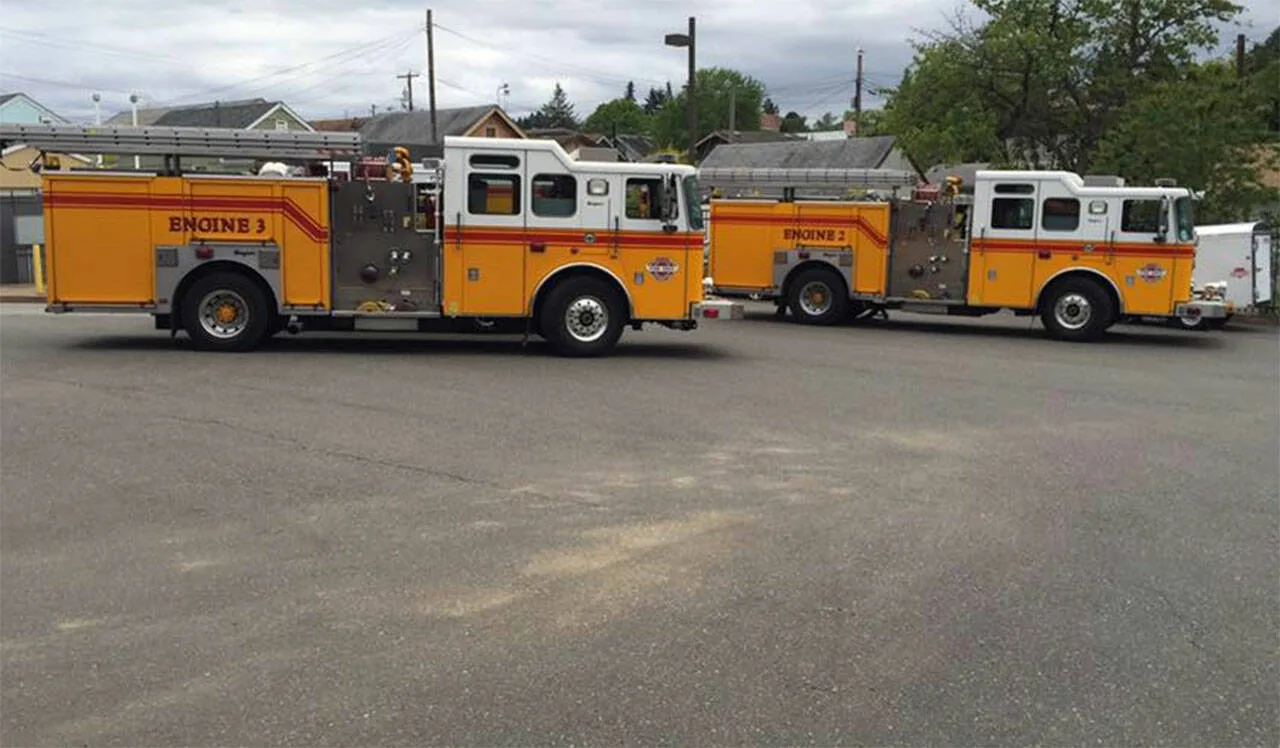 Bremerton Fire Department engines parked at a station, representing the department that responded to a fatal Manette explosion