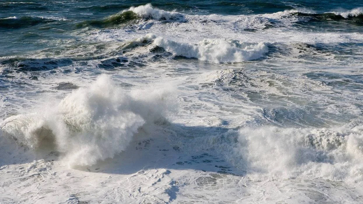 Gulf Coast Braces for Escalating Wildfire and Rip Current Risks Amidst Persistent Warming Trend