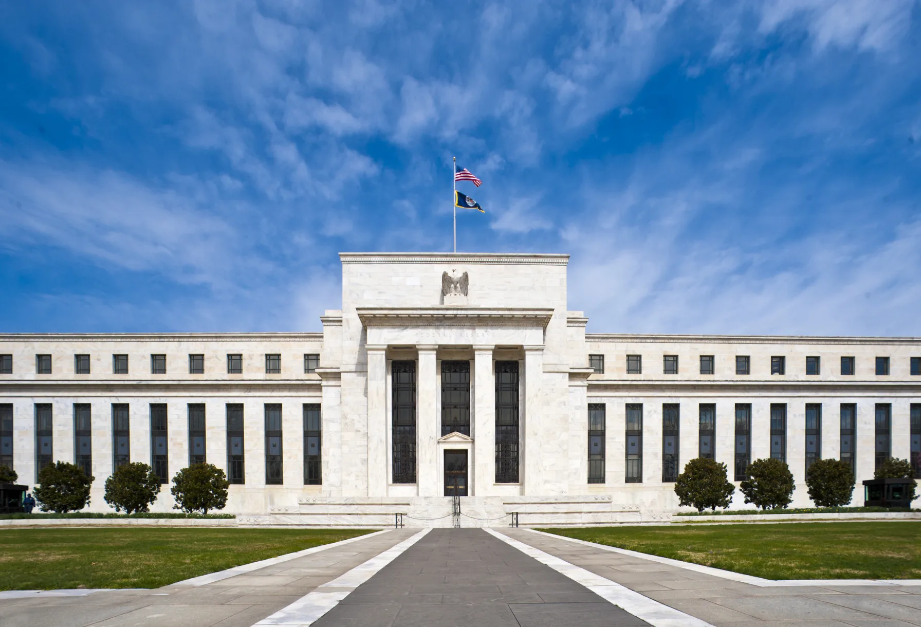 The Marriner S. Eccles Federal Reserve building in Washington, D.C. under a blue sky