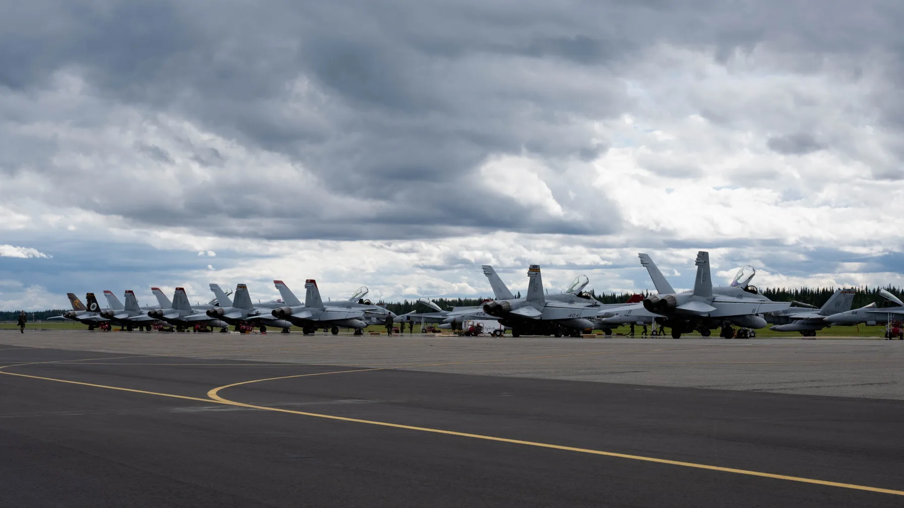 U.S. Marine Corps F/A-18 Hornet fighter jets of VMFA-323 on the flight line