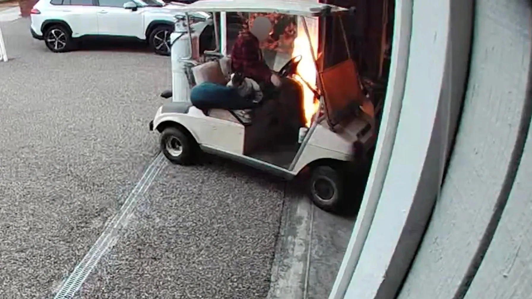 Surveillance still showing the golf cart used in a Port Orchard garage arson, released by the Kitsap County Sheriff's Office