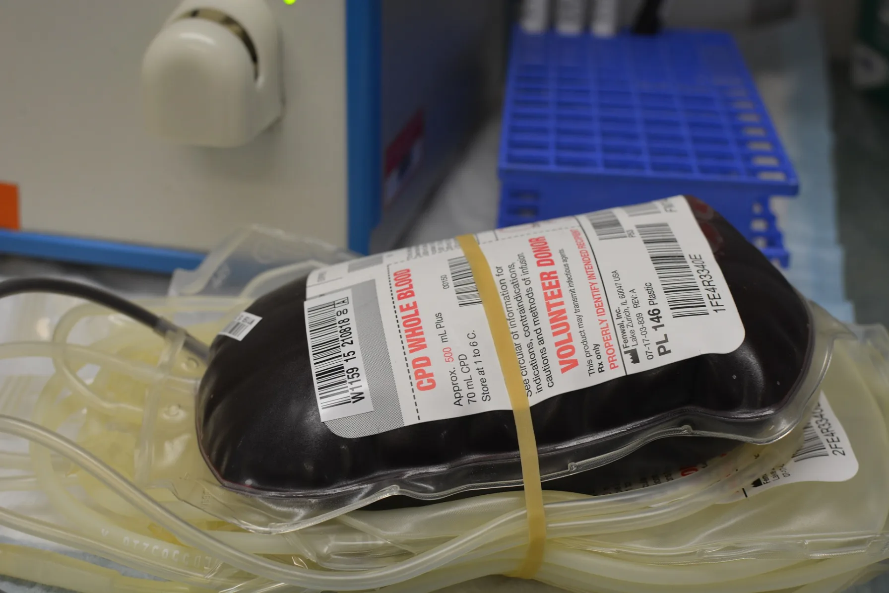A bag of whole blood labeled Volunteer Donor at a blood bank