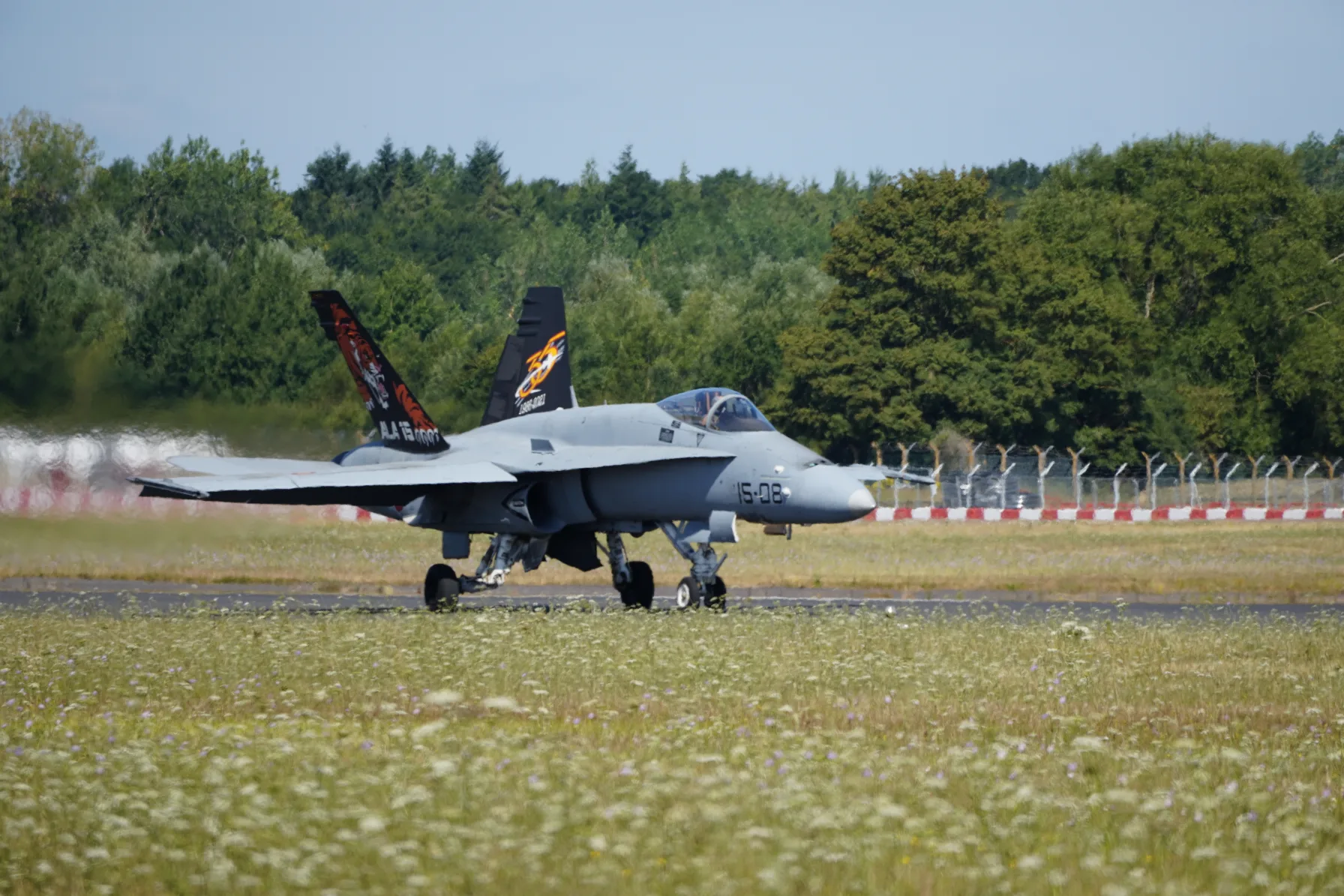 A Spanish Air Force F/A-18 Hornet fighter jet in flight, the same aircraft type used in NATO's air-policing mission over Romania