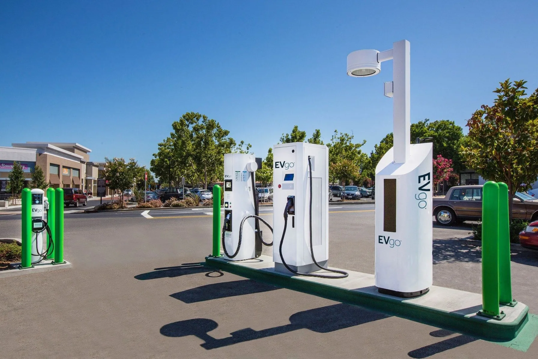 EVgo electric vehicle charging stations in a sunny parking lot